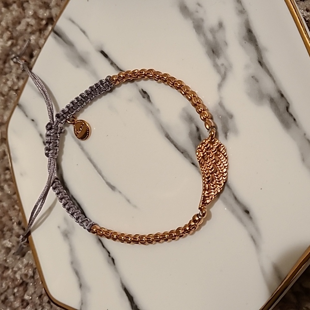 Rose gold beaded & grey Stella & Dot Bracelet with feather charm